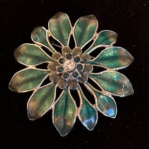 Vintage Silver Tone, Green Floral with blue rhinestones and a clear centerBrooch